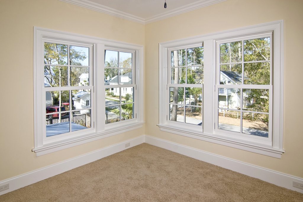 White vertical sliding windows