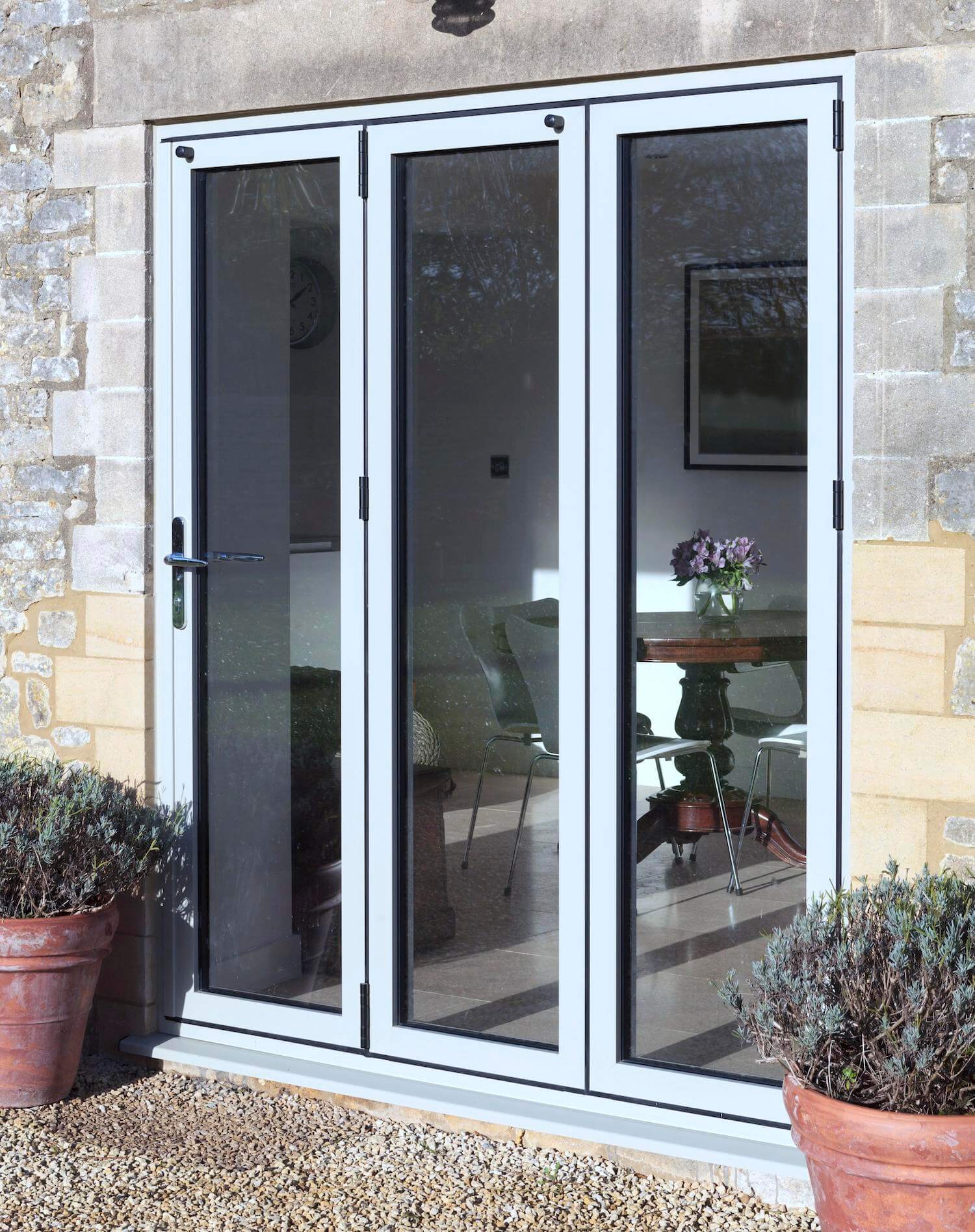 Discover the Best Slimline Aluminium Bifold Doors | Direct Trade Windows