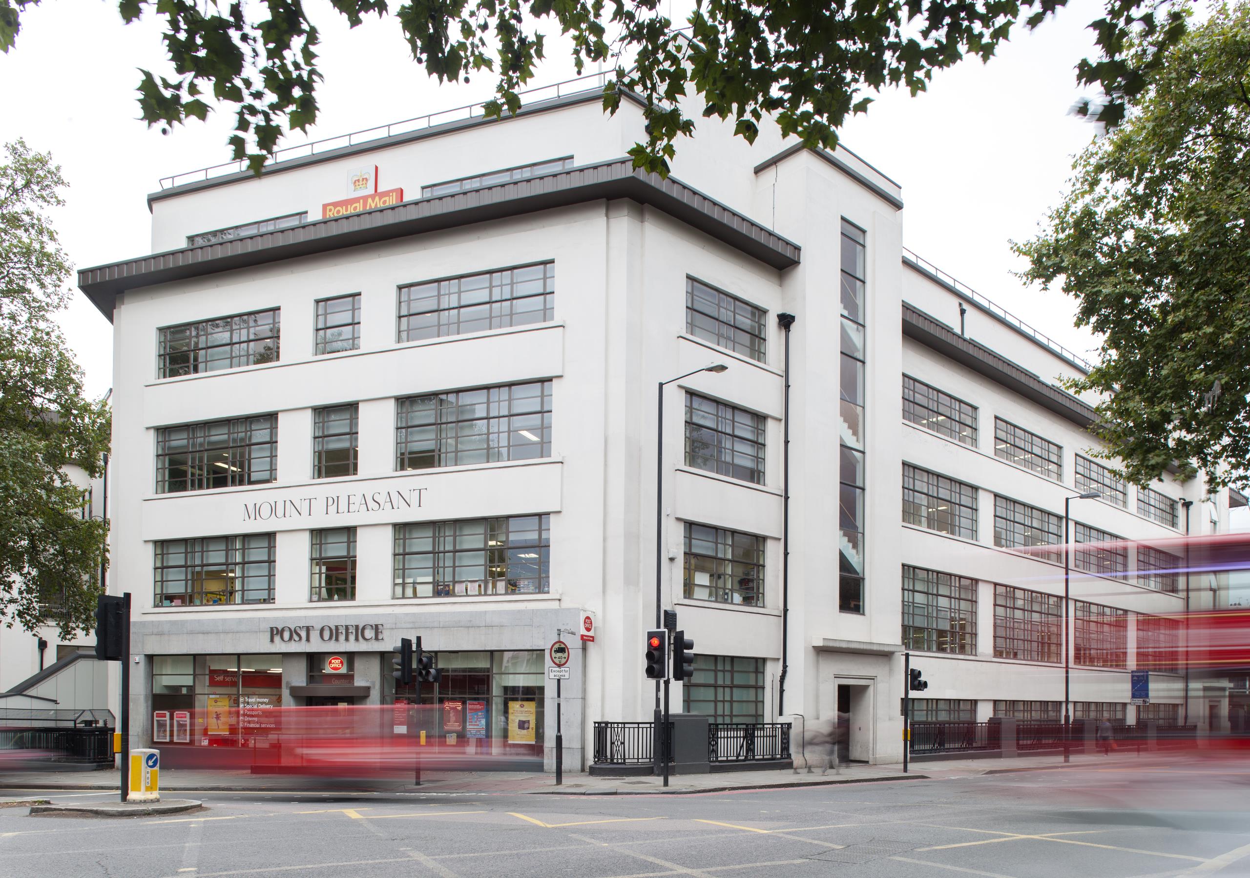 Commercial building featuring Alitherm Heritage steel look aluminium windows with slim sightlines.