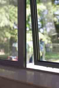 Alitherm 300 casement window with black frame and double glazing.