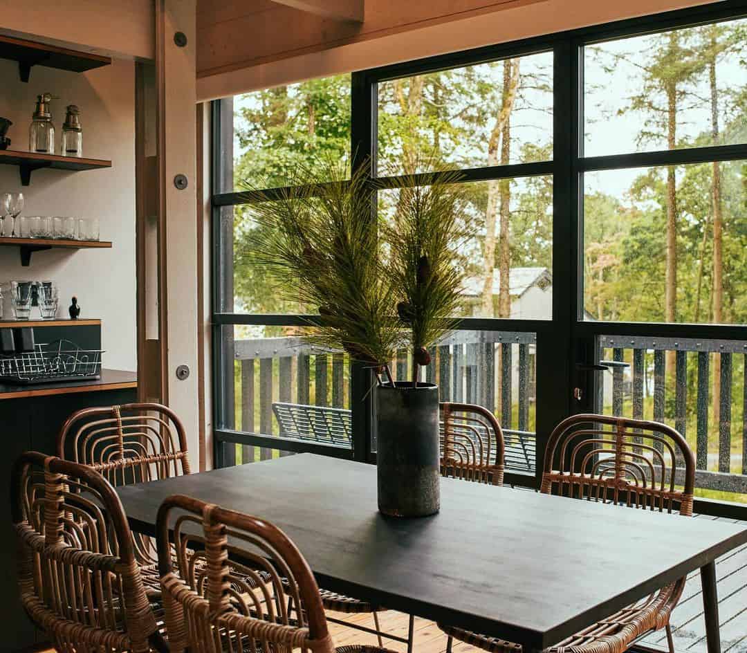 Aluminium doors with a steel finish, providing a sleek, contemporary look and seamless indoor-outdoo.