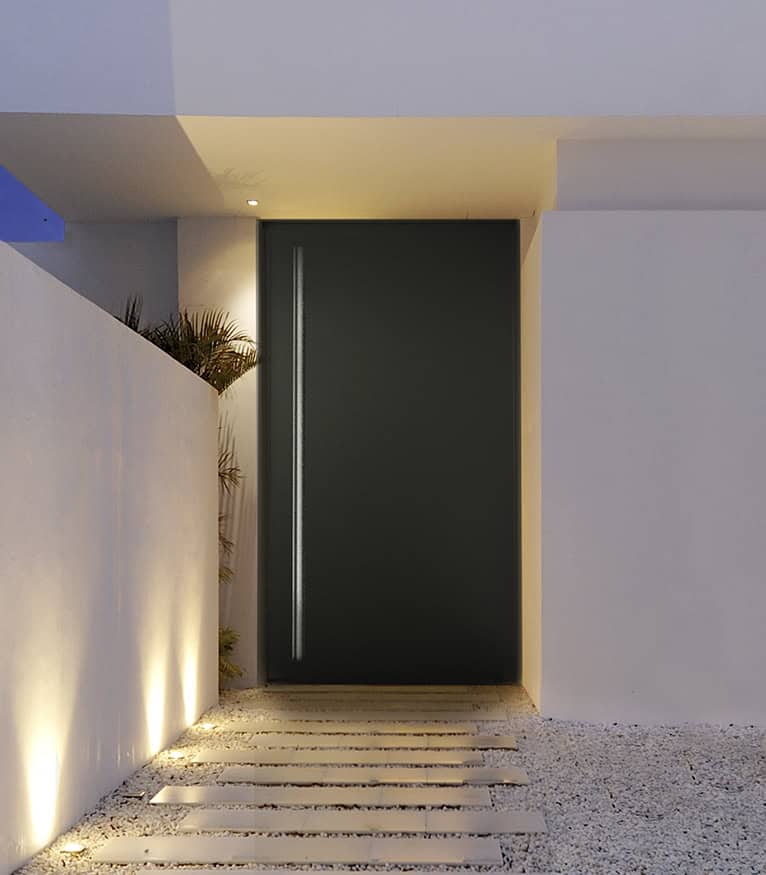 Black Cortizo Millennium pivot panel door with sleek design and modern finish.