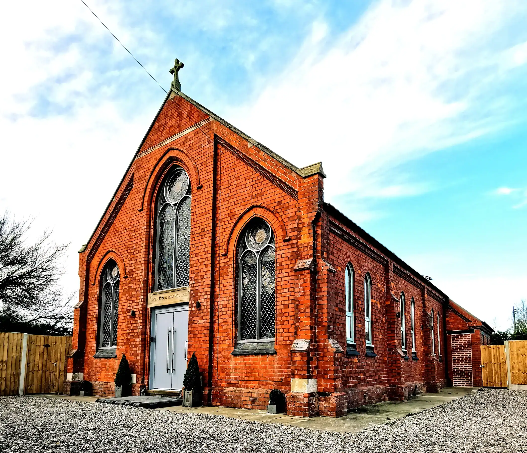 An image showcasing modern aluminium windows fitted in a historic church building.